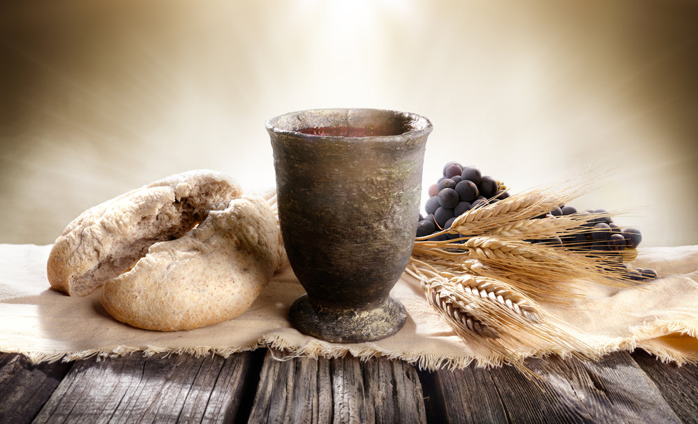 Communion - Unleavened Bread With Chalice Of Wine And Cross Light